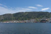 Coastal Town by Mountain and Fjord